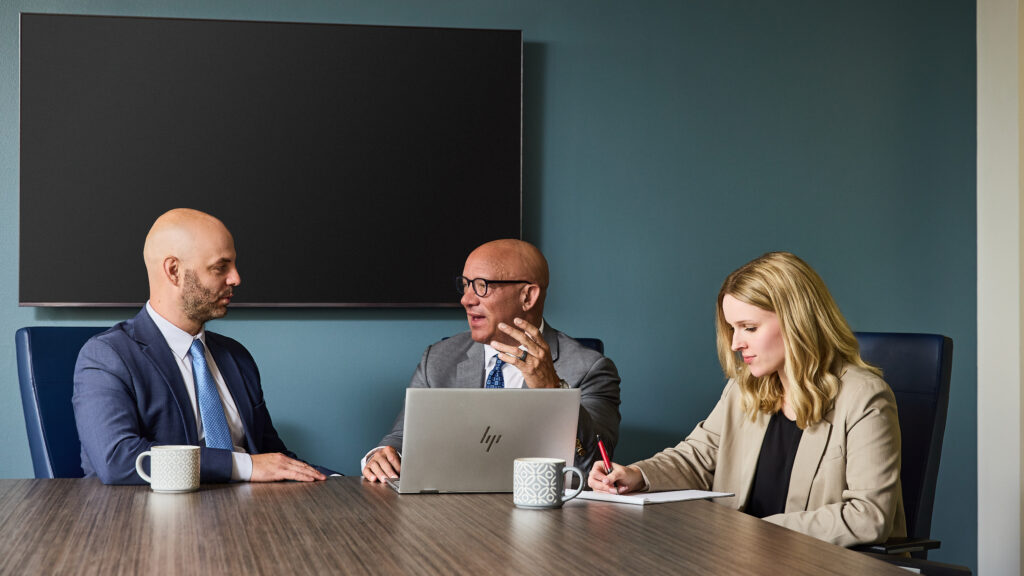 Attorneys meeting in conference room